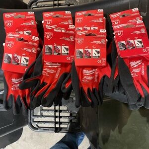Milwaukee Red and Black Protective Gloves size L Brand New. 8 pairs.